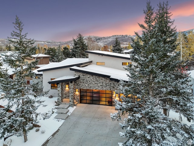 modern home featuring a mountain view
