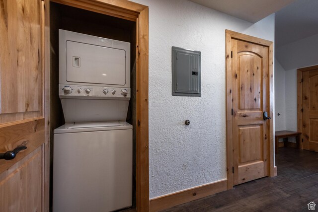 2653 W Canyons Resort Dr Unit 322, Park City, UT 84098 - washroom featuring electric panel, stacked washer and clothes dryer, and dark wood-style flooring