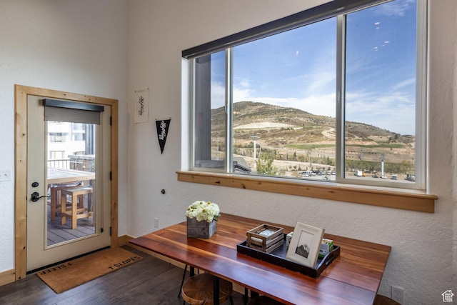 2653 W Canyons Resort Dr Unit 322, Park City, UT 84098 - doorway with wood finished floors, a mountain view, and a textured wall