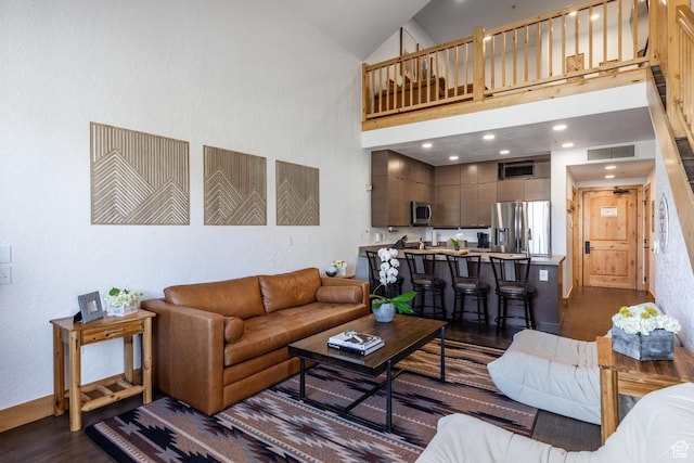 2653 W Canyons Resort Dr Unit 322, Park City, UT 84098 - living area with dark wood-style flooring, high vaulted ceiling, and recessed lighting