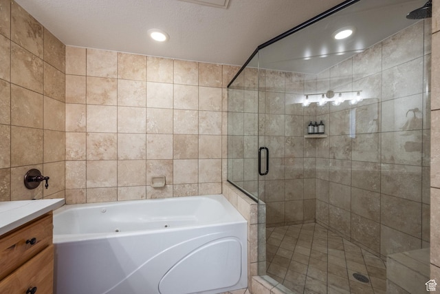 2653 W Canyons Resort Dr Unit 322, Park City, UT 84098 - full bathroom with a stall shower, a garden tub, vanity, tile walls, and recessed lighting