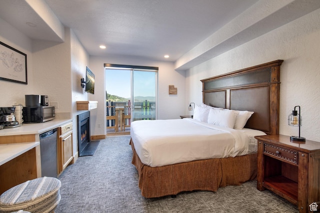 2653 W Canyons Resort Dr Unit 322, Park City, UT 84098 - carpeted bedroom with access to outside, a textured wall, a fireplace with flush hearth, and recessed lighting