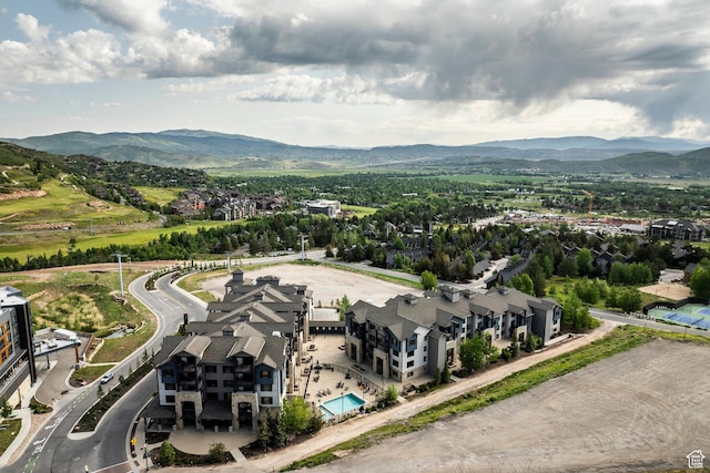 2653 W Canyons Resort Dr Unit 322, Park City, UT 84098 - drone / aerial view of a mountainous background and a pool