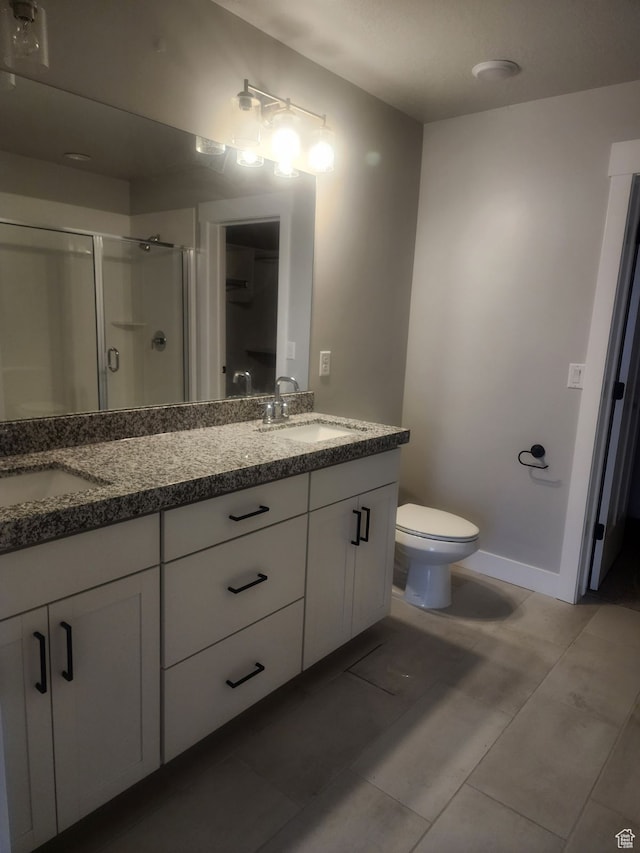 9781 N Aaron Ave Unit 207, Eagle Mountain, UT 84005 - bathroom with tile patterned flooring, vanity, toilet, and walk in shower