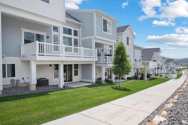 9781 N Aaron Ave Unit 207, Eagle Mountain, UT 84005 - view of community with a residential view and a lawn