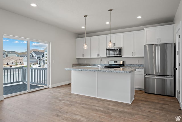9781 N Aaron Ave Unit 207, Eagle Mountain, UT 84005 - kitchen with stainless steel appliances, wood finished floors, white cabinetry, and recessed lighting