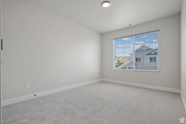 9781 N Aaron Ave Unit 207, Eagle Mountain, UT 84005 - carpeted empty room featuring baseboards