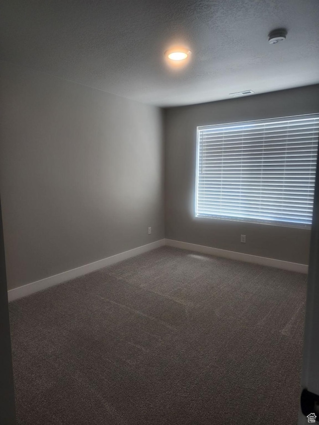 9781 N Aaron Ave Unit 207, Eagle Mountain, UT 84005 - carpeted spare room with baseboards, a smoke detector, and recessed lighting