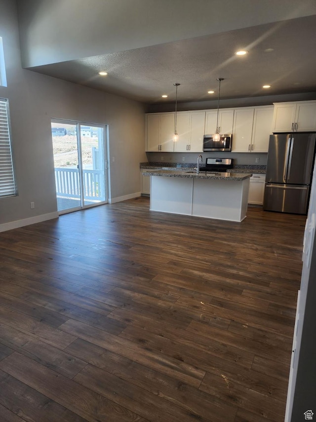 9781 N Aaron Ave Unit 207, Eagle Mountain, UT 84005 - kitchen with stainless steel appliances, baseboards, white cabinetry, and recessed lighting