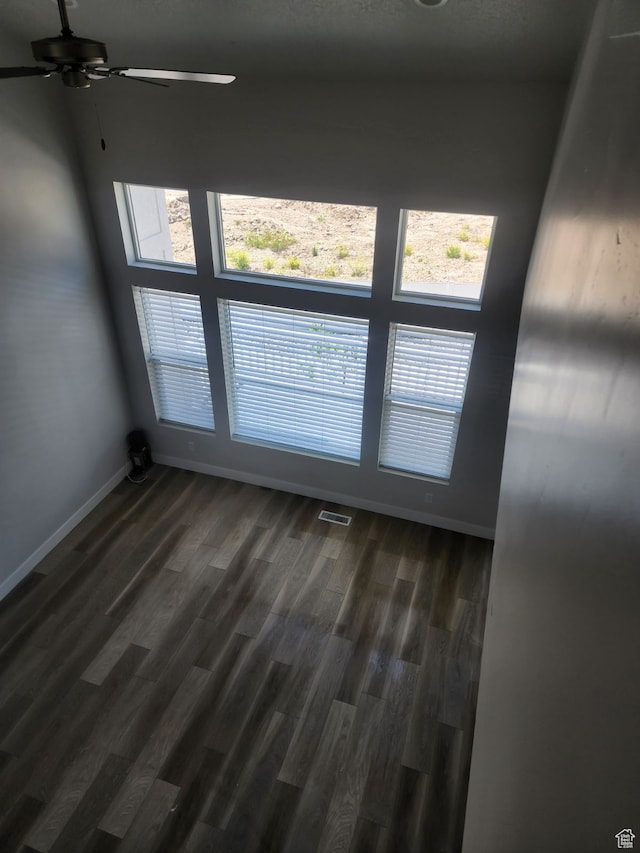 9807 N Aaron Ave Unit 210, Eagle Mountain, UT 84005 - spare room featuring plenty of natural light, ceiling fan, and dark hardwood / wood-style flooring