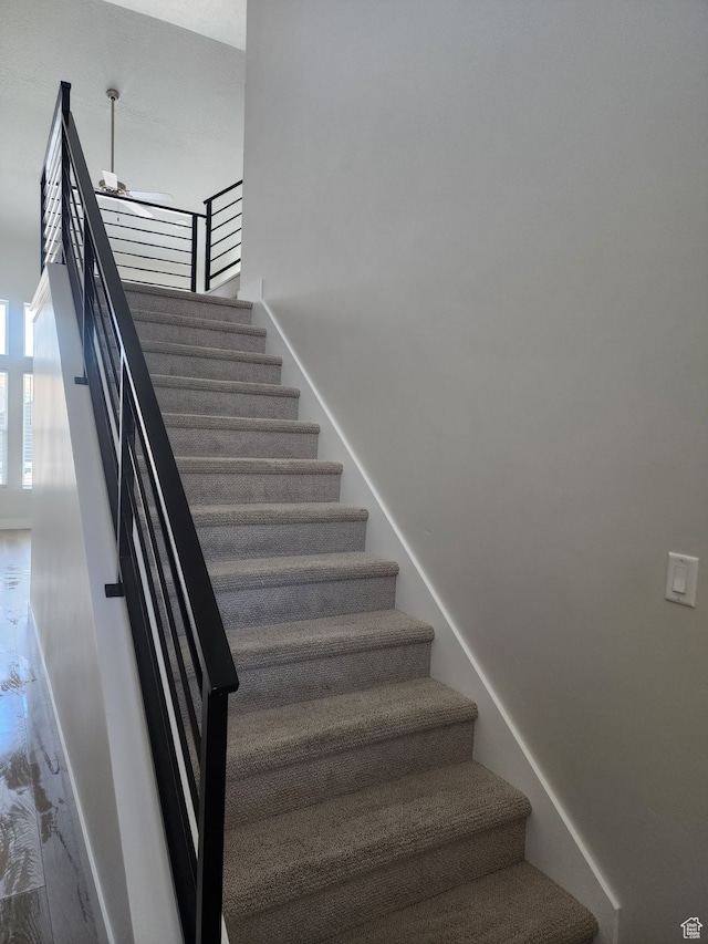9807 N Aaron Ave Unit 210, Eagle Mountain, UT 84005 - stairway with hardwood / wood-style flooring