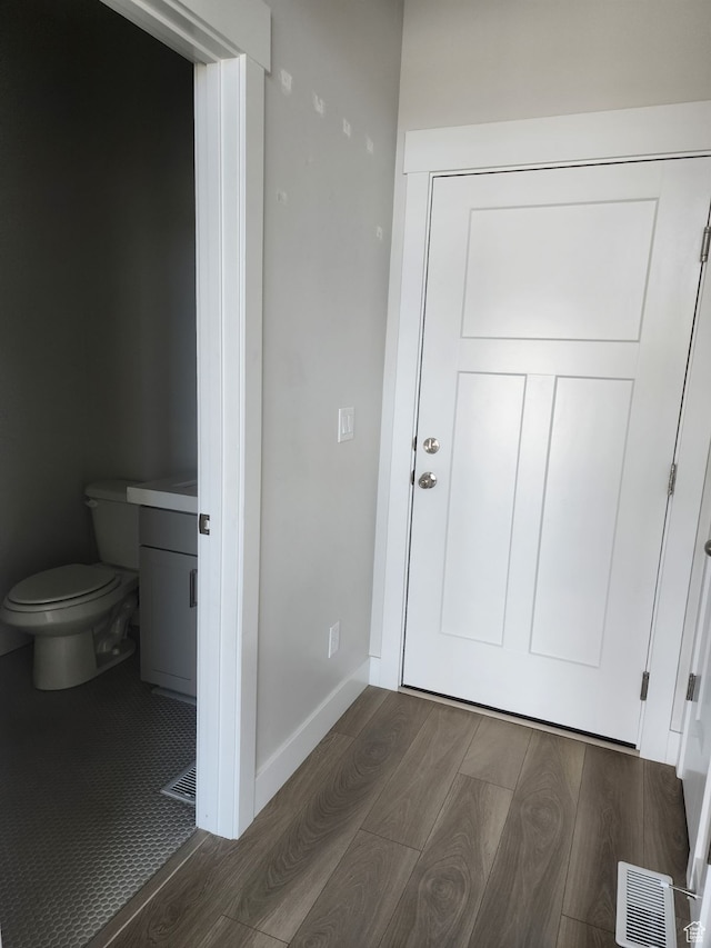 9807 N Aaron Ave Unit 210, Eagle Mountain, UT 84005 - interior space featuring wood-type flooring and toilet