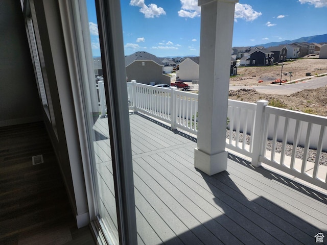 9807 N Aaron Ave Unit 210, Eagle Mountain, UT 84005 - wooden deck featuring a residential view and a mountain view