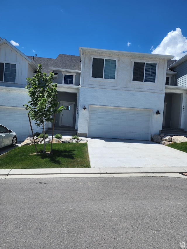 9807 N Aaron Ave Unit 210, Eagle Mountain, UT 84005 - view of front of house with a garage