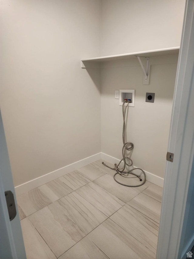 9807 N Aaron Ave Unit 210, Eagle Mountain, UT 84005 - laundry room featuring hookup for a washing machine, electric dryer hookup, and baseboards