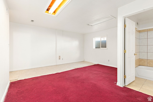 view of tiled spare room