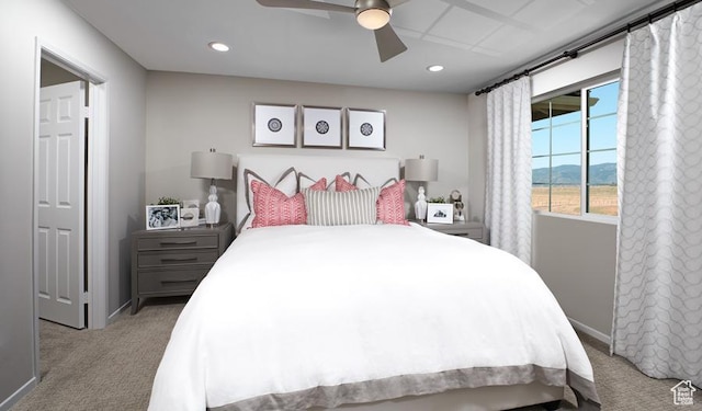 437 W Lefty Ln Unit 1118, Stansbury Park, UT 84074 - bedroom with carpet flooring, baseboards, recessed lighting, a ceiling fan, and a mountain view