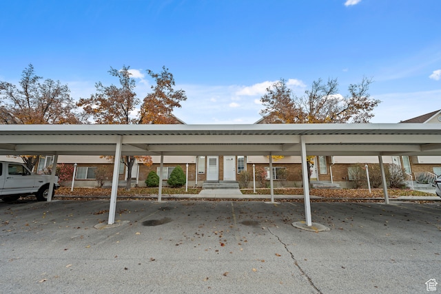 view of car parking with a carport