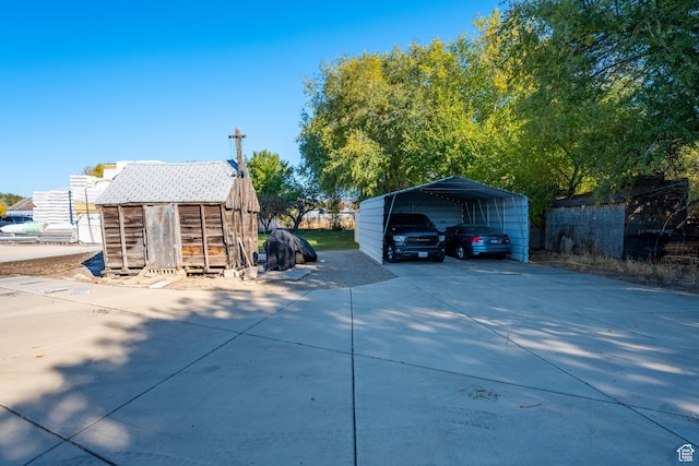 exterior space with a storage unit and a carport