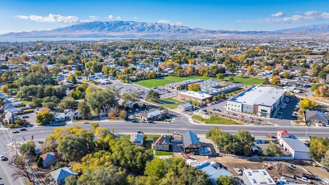 birds eye view of property with a mountain view