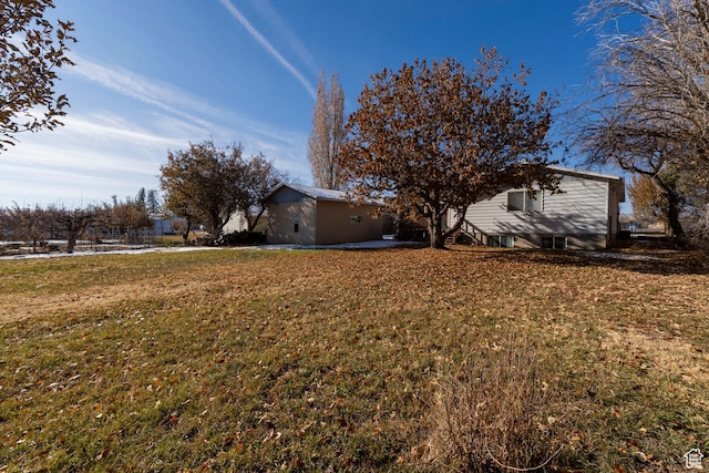 1052 N 2500 W, Vernal, UT 84078 - view of side of home with a lawn