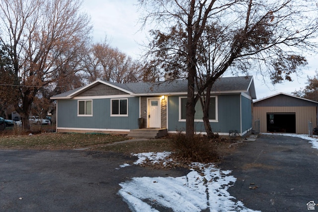 1052 N 2500 W, Vernal, UT 84078 - ranch-style home featuring driveway, an outbuilding, and a garage