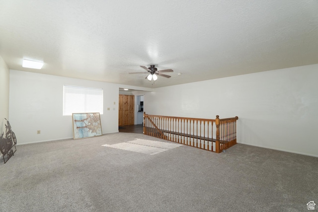 1052 N 2500 W, Vernal, UT 84078 - carpeted empty room with a ceiling fan and baseboards