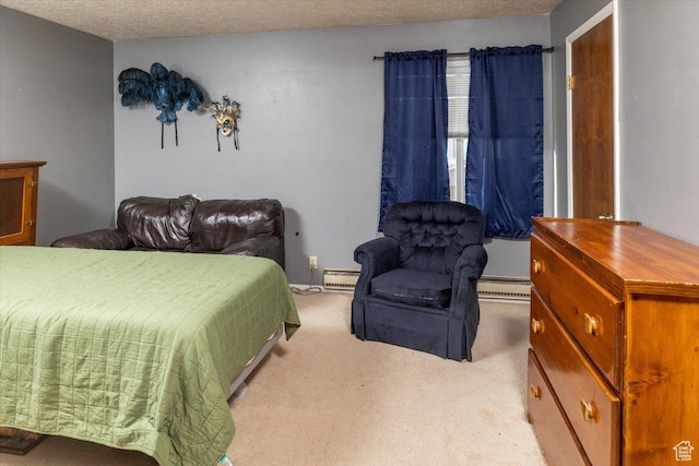 281 W 600 N Unit 4, Logan, UT 84321 - bedroom with a textured ceiling, light colored carpet, and a baseboard heating unit