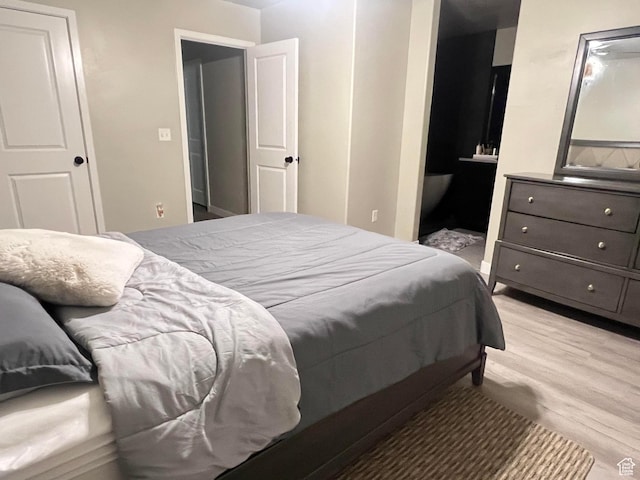 bedroom featuring light hardwood / wood-style flooring