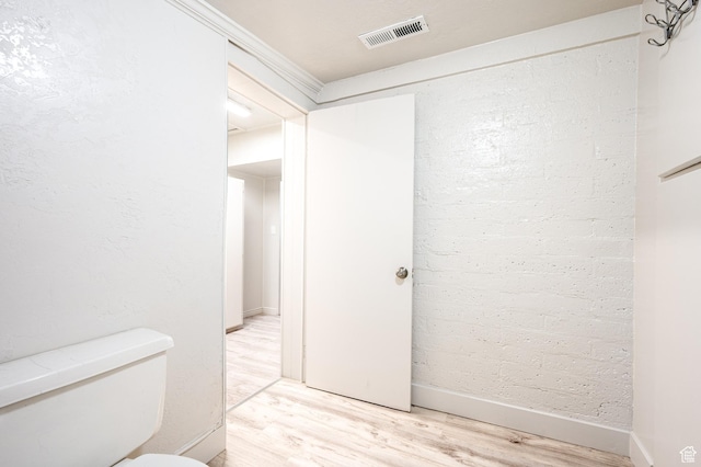 1180 S Cove View Rd, Richfield, UT 84701 - bathroom featuring hardwood / wood-style floors and toilet