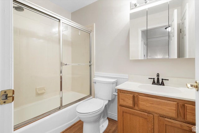 68 E 100 N, Nephi, UT 84648 - full bath with toilet, vanity, wood finished floors, and enclosed tub / shower combo