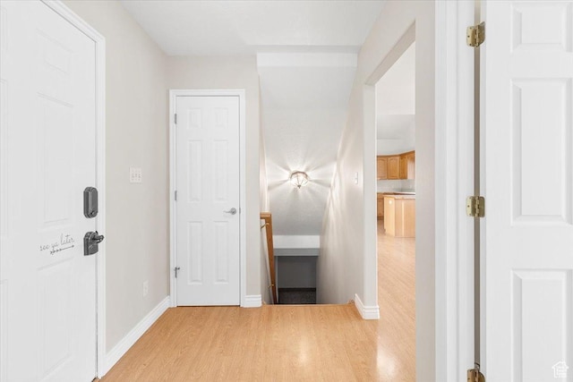 corridor featuring light hardwood / wood-style flooring