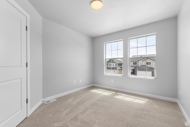 6636 W Prairie Fire Ln Unit 733, Herriman, UT 84096 - unfurnished room with light carpet