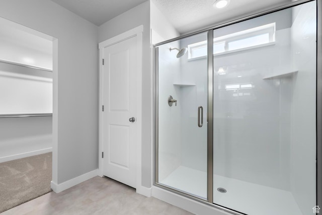 6636 W Prairie Fire Ln Unit 733, Herriman, UT 84096 - bathroom featuring a shower with shower door