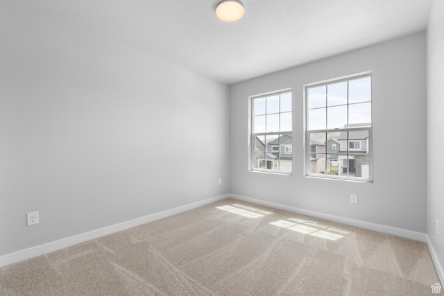 6636 W Prairie Fire Ln Unit 733, Herriman, UT 84096 - carpeted empty room with a textured ceiling
