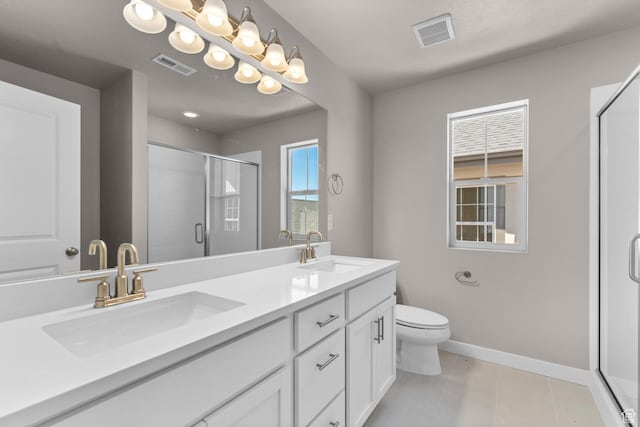 11209 S Easy Bee Rd, South Jordan, UT 84009 - full bath with double vanity, a stall shower, baseboards, toilet, and tile patterned floors