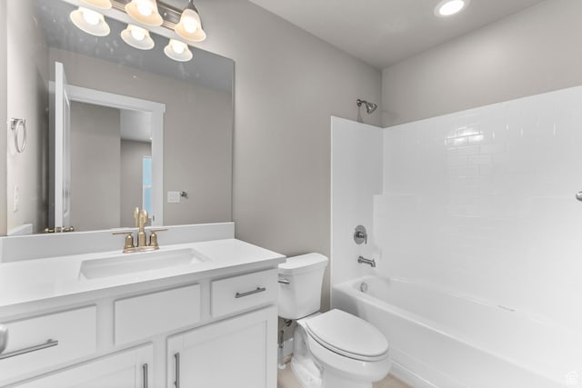 full bathroom featuring vanity, shower / bathtub combination, and toilet