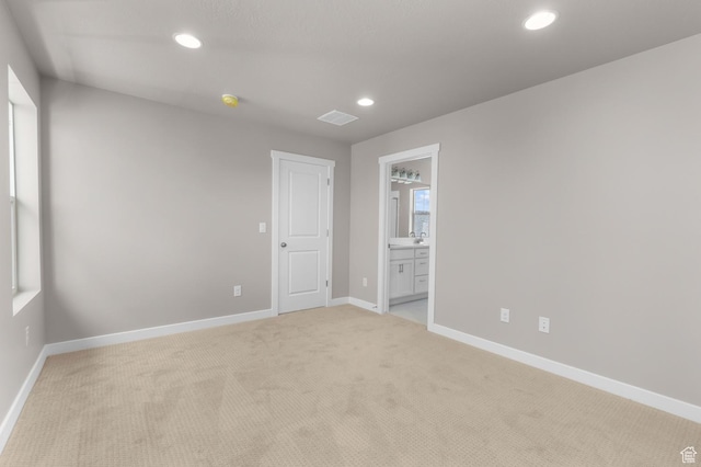 11209 S Easy Bee Rd, South Jordan, UT 84009 - unfurnished bedroom with light colored carpet, baseboards, recessed lighting, and ensuite bathroom