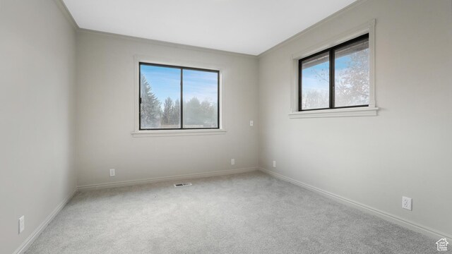1583 E 1500 N, Logan, UT 84341 - carpeted spare room featuring a wealth of natural light and crown molding