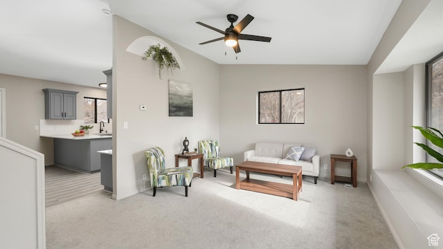 1583 E 1500 N, Logan, UT 84341 - carpeted living room featuring ceiling fan, sink, and vaulted ceiling