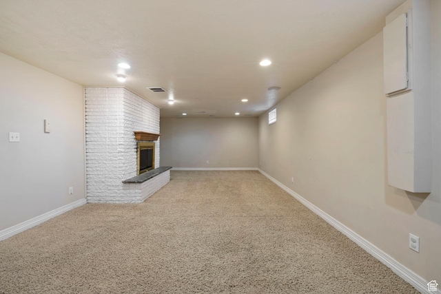 173 W 850 S, Orem, UT 84058 - unfurnished living room featuring a fireplace, recessed lighting, baseboards, and light colored carpet