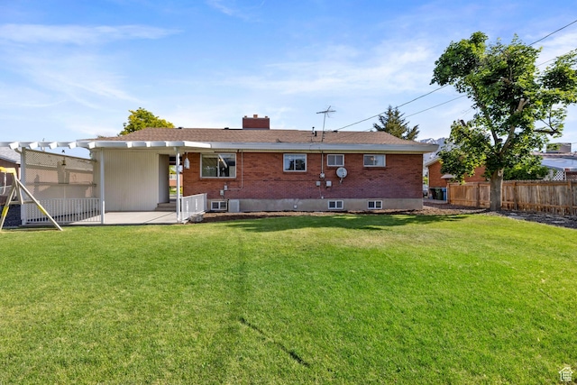 173 W 850 S, Orem, UT 84058 - rear view of house featuring a patio area, a chimney, and brick siding