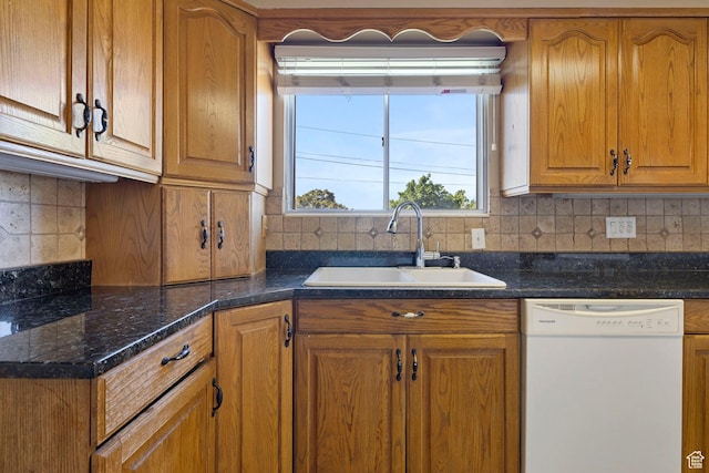 173 W 850 S, Orem, UT 84058 - kitchen featuring white dishwasher, a sink, brown cabinets, and backsplash