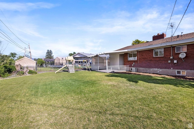 173 W 850 S, Orem, UT 84058 - view of yard featuring a playground and central air condition unit