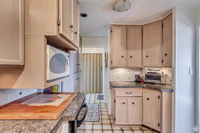 130 S 1300 E 703 &4, Salt Lake City, UT 84102 - kitchen featuring decorative backsplash, light tile patterned floors, and a textured ceiling