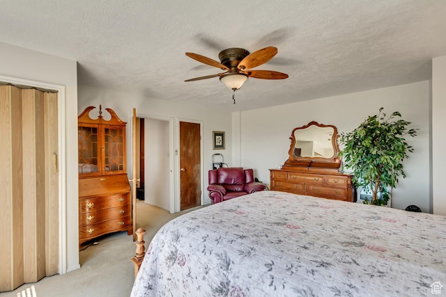 130 S 1300 E 703 &4, Salt Lake City, UT 84102 - bedroom with ceiling fan, light carpet, and a textured ceiling