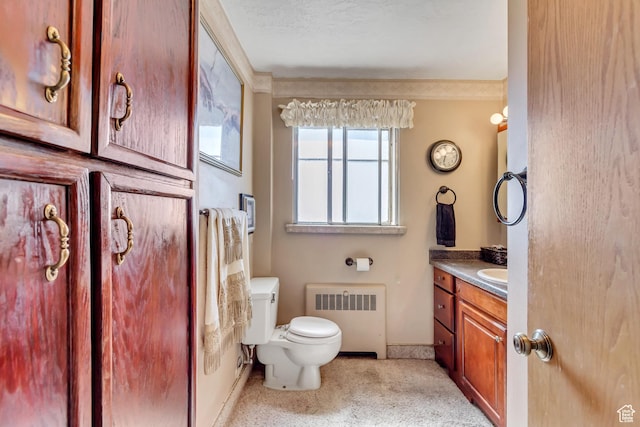130 S 1300 E 703 &4, Salt Lake City, UT 84102 - bathroom featuring a textured ceiling, vanity, toilet, and radiator