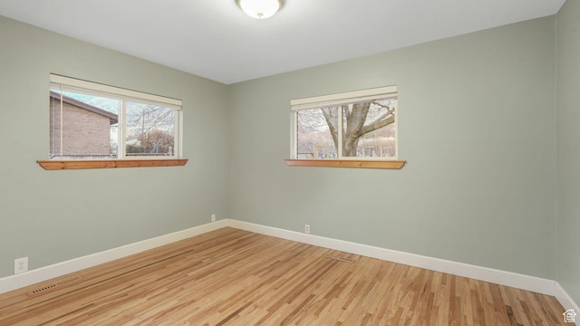 120 N 1400 E, Pleasant Grove, UT 84062 - empty room featuring hardwood / wood-style flooring and a wealth of natural light