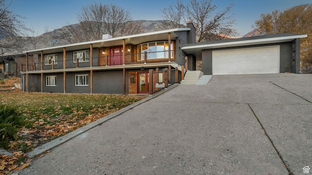 120 N 1400 E, Pleasant Grove, UT 84062 - view of front of home featuring a balcony and a garage