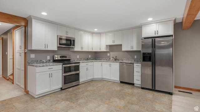 120 N 1400 E, Pleasant Grove, UT 84062 - kitchen featuring light stone counters, sink, white cabinetry, and stainless steel appliances
